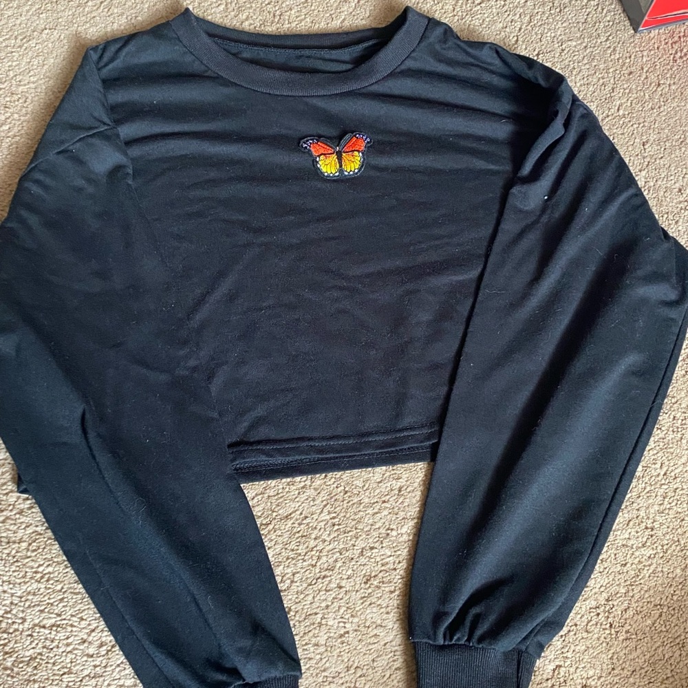 Black butterfly cropped crew neck.